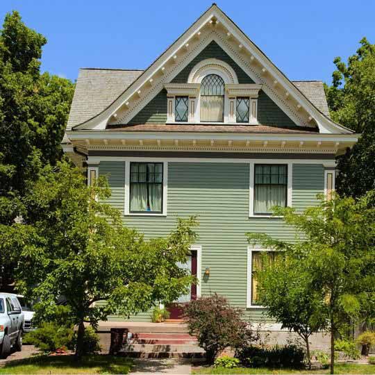 The beautiful results of restoring the Minneapolis Victorian home's exterior paint envelope