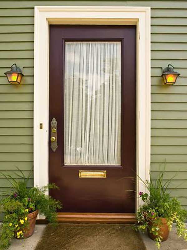 A front door restored with new veneer and new oak threshhold using superior coatings