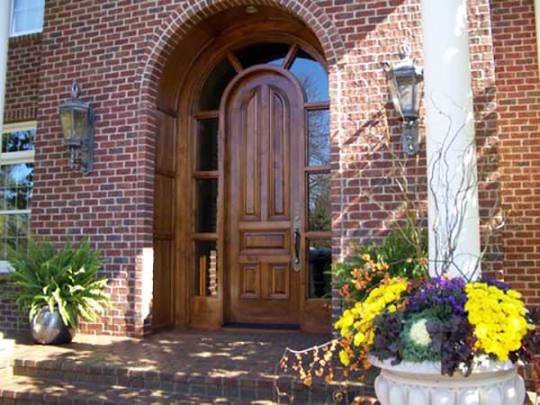 Painting this home's exterior columns increases curb appeal