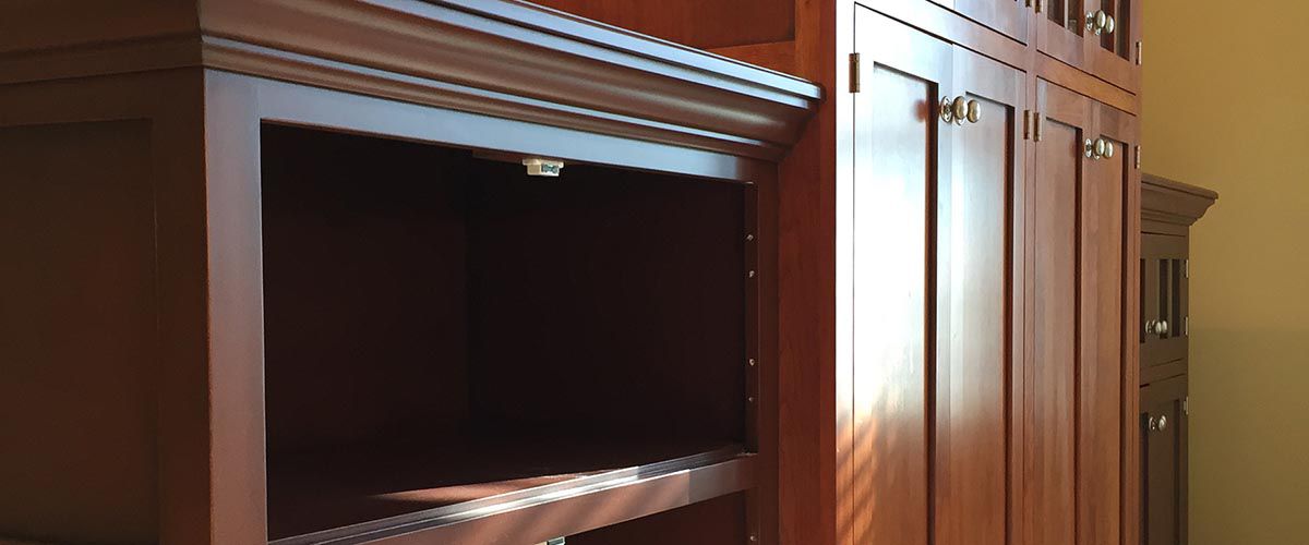 The skilled process of preparing kitchen cabinets for refinishing