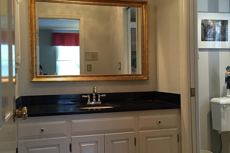 Renovating master bath includes painting bathroom cabinets